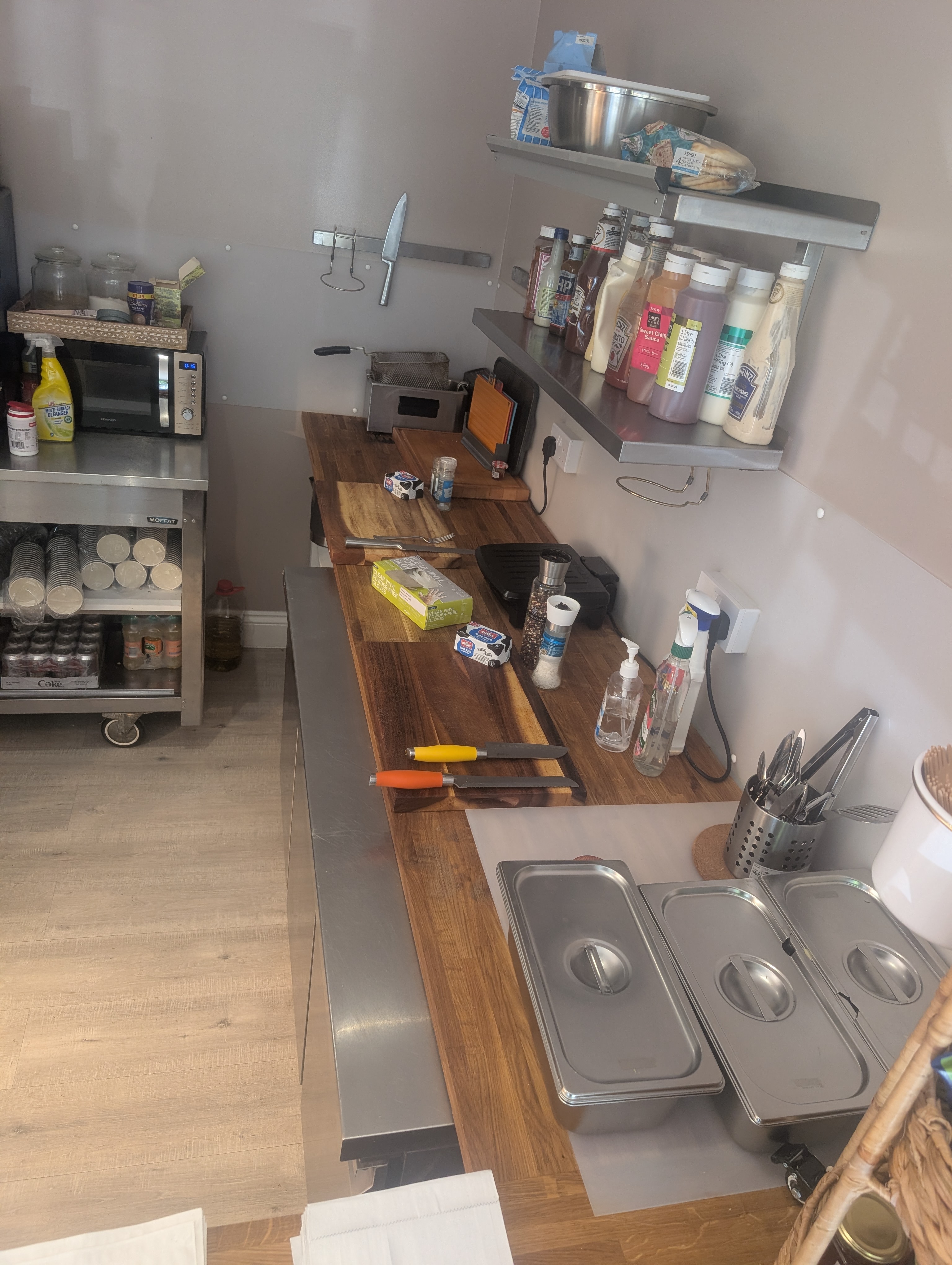 Bites Deli clean prep kitchen — stainless steel surfaces and fresh fillings